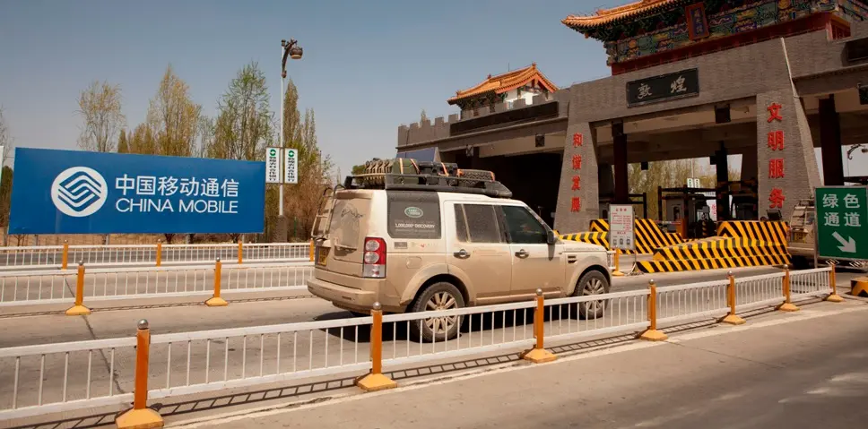 Land Rover Journey of Discovery taglia il traguardo a Pechino