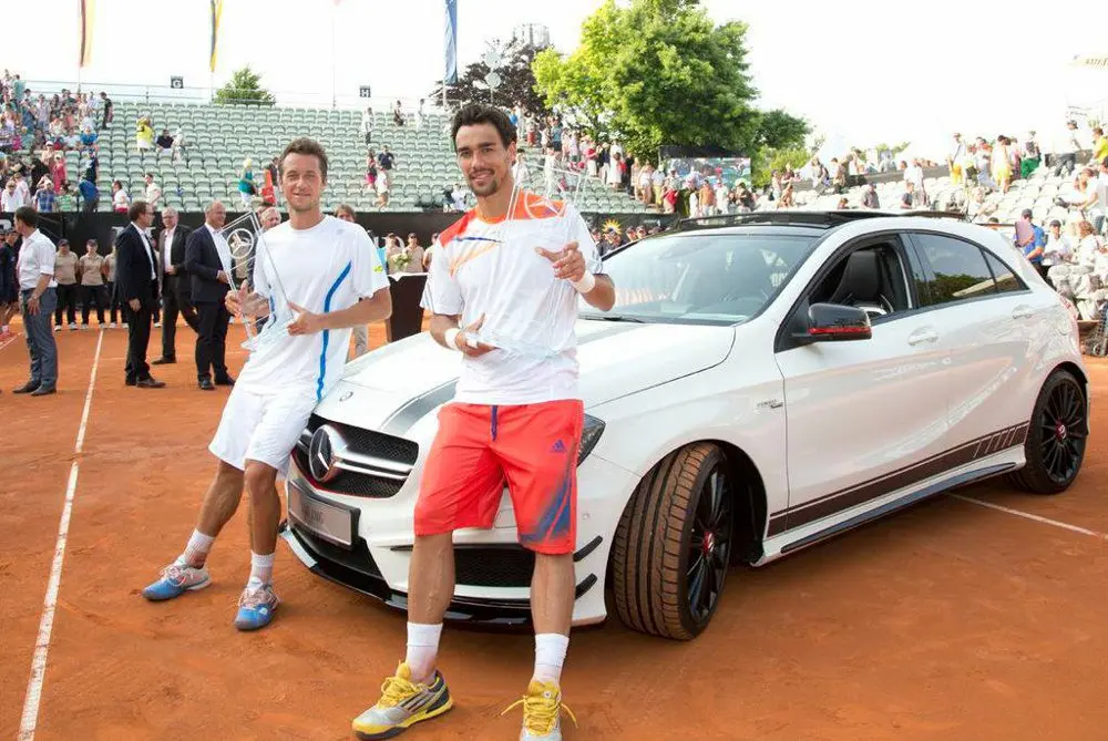 Mercedes Cup 2013: il vincitore Fabio Fognini festeggia al volante di A 45 AMG